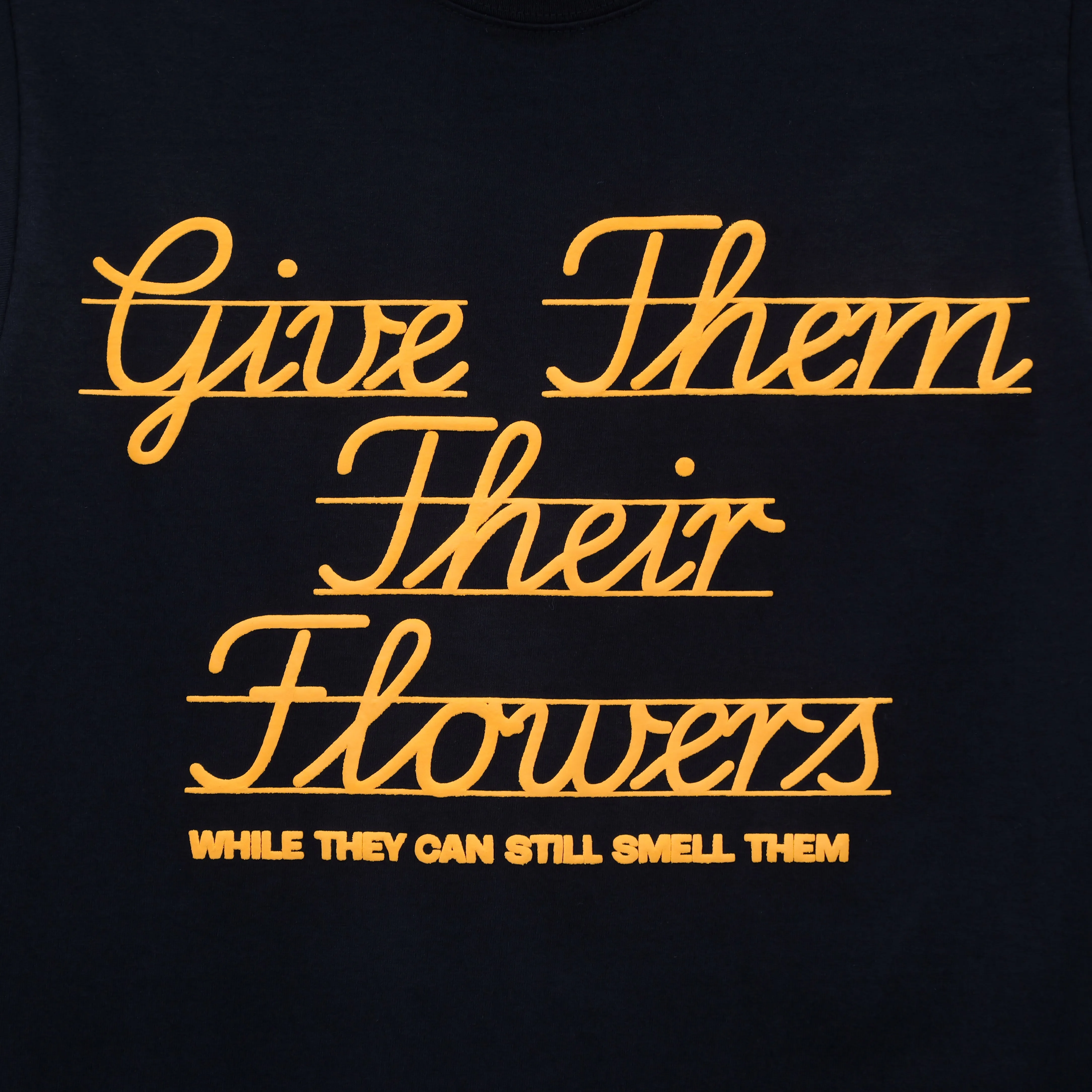 GIVE THEM THEIR FLOWERS SPELL OUT TEE BLACK