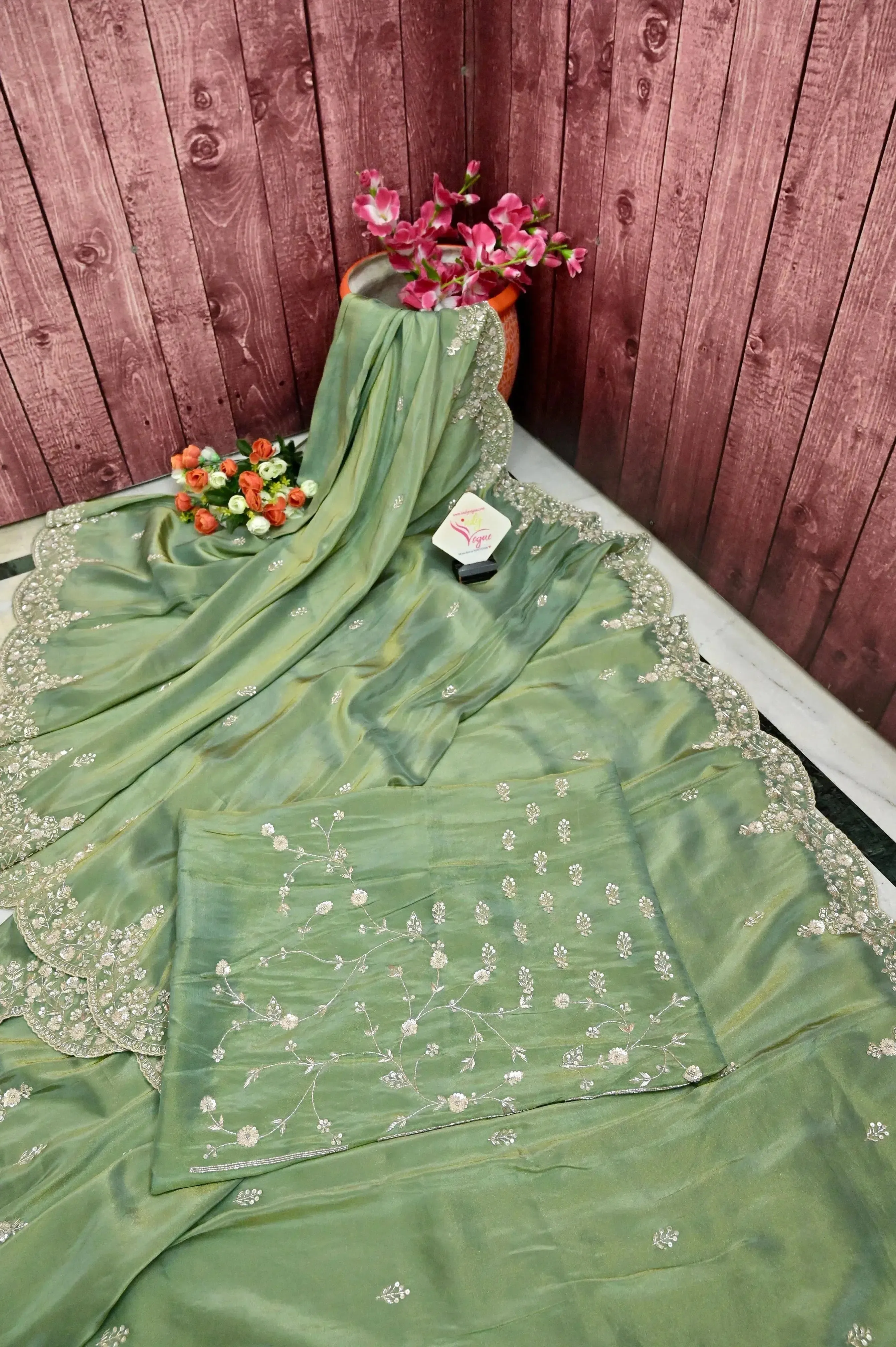 Moss Green Color Georgette Tissue Saree with Hand Zardozi Work and Scallop Border