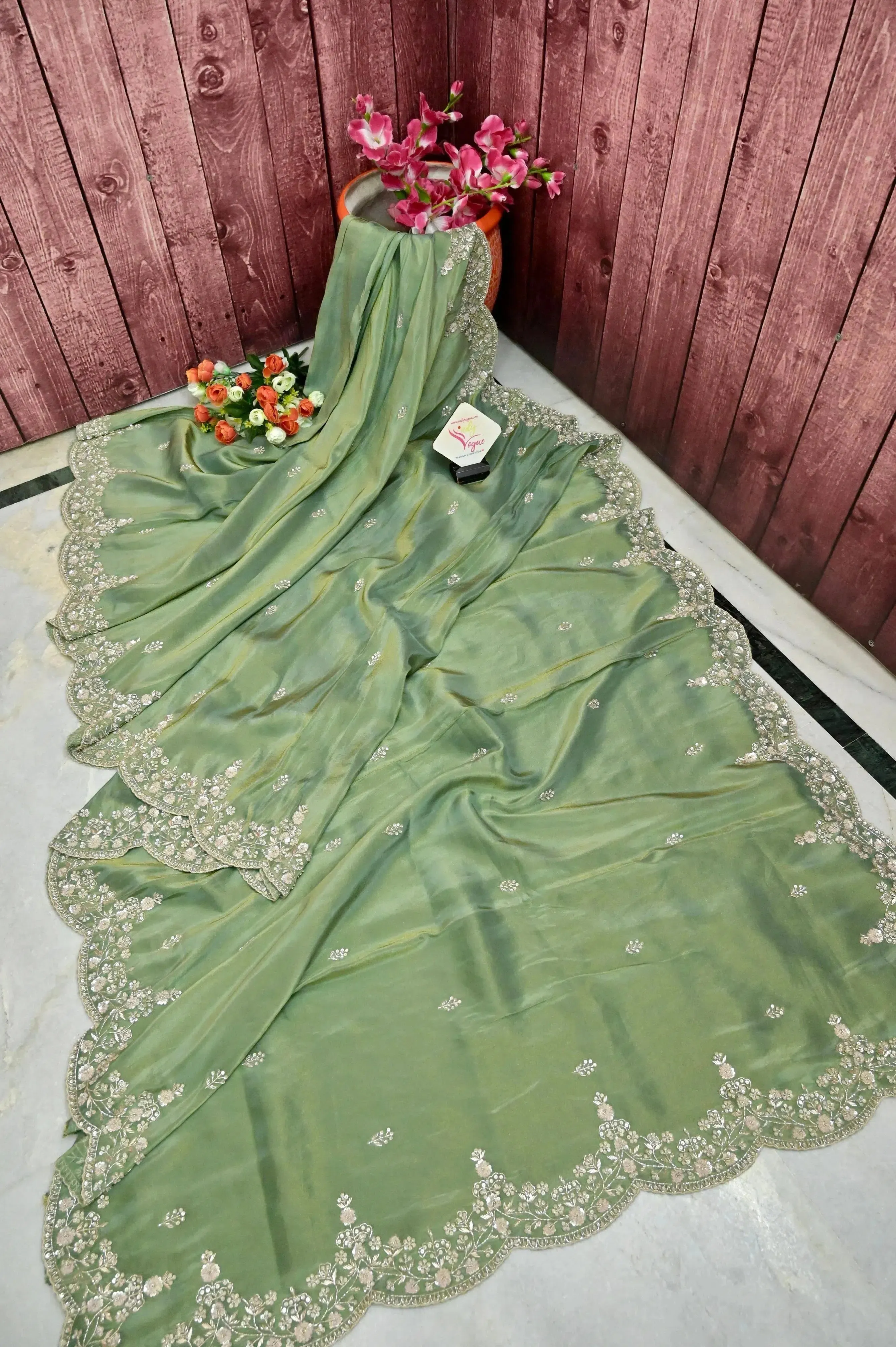 Moss Green Color Georgette Tissue Saree with Hand Zardozi Work and Scallop Border