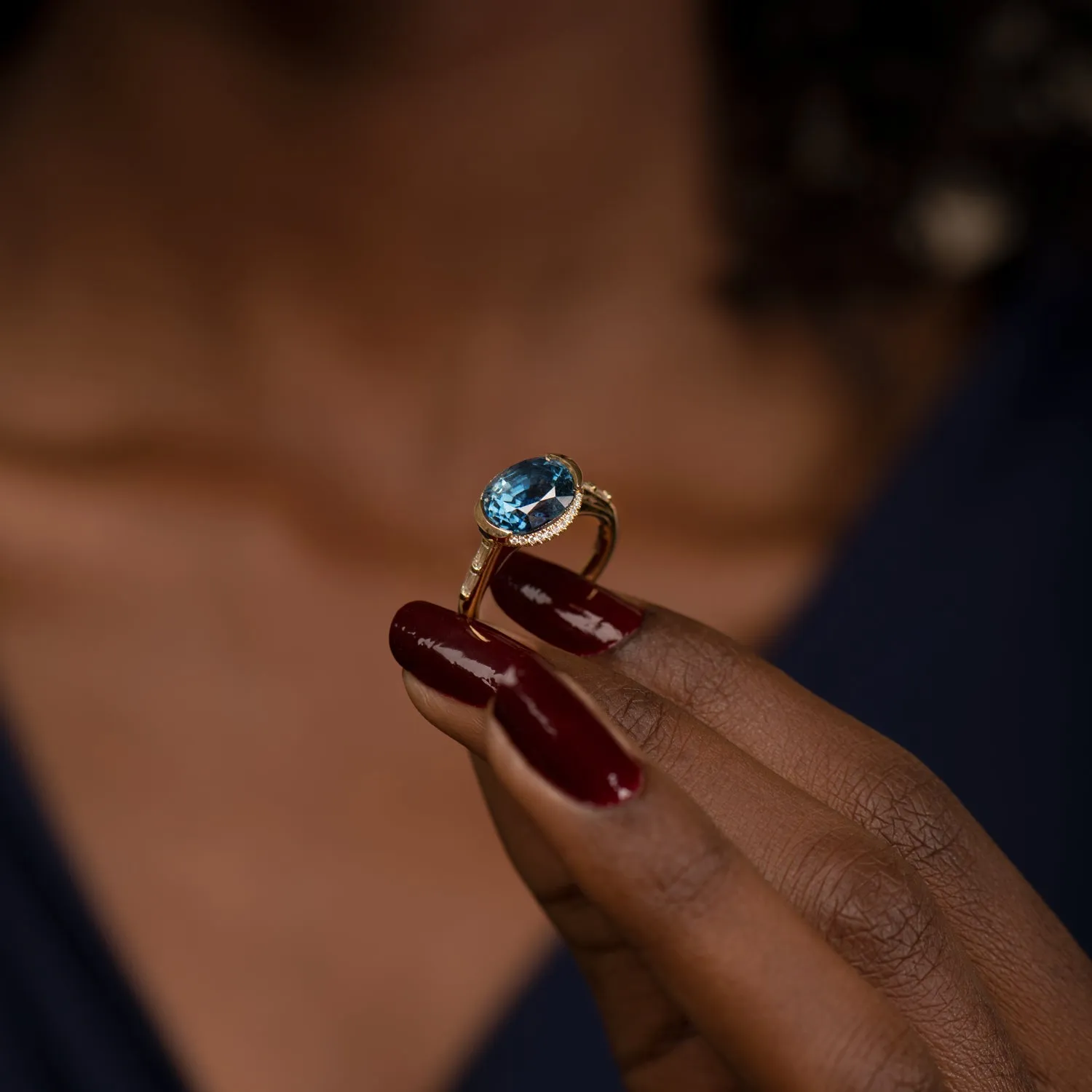 Oval Sapphire Engagement Ring with a Brilliant Diamond Belt